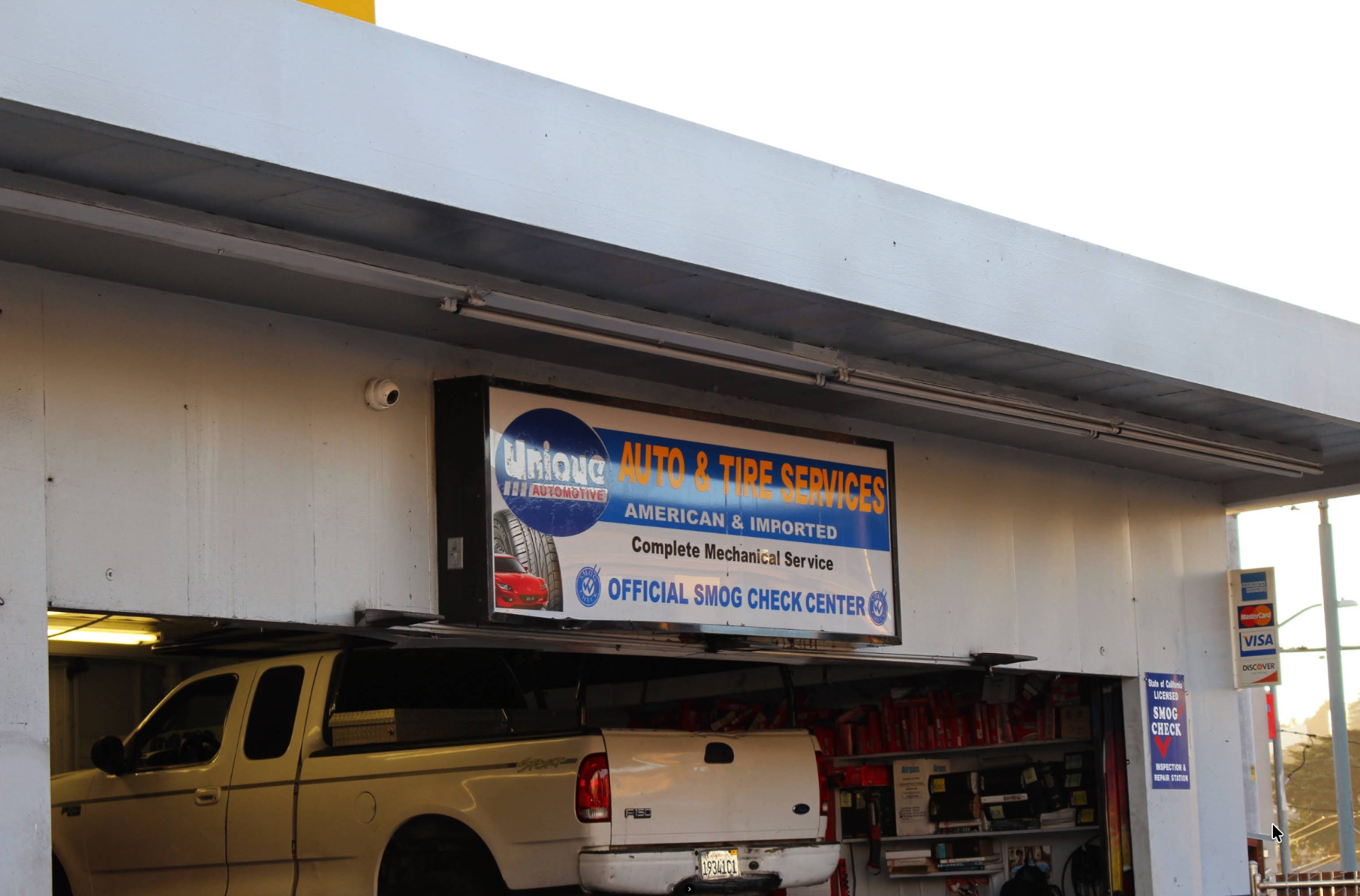 Unique Automotive storefront with Auto & Tire Services sign