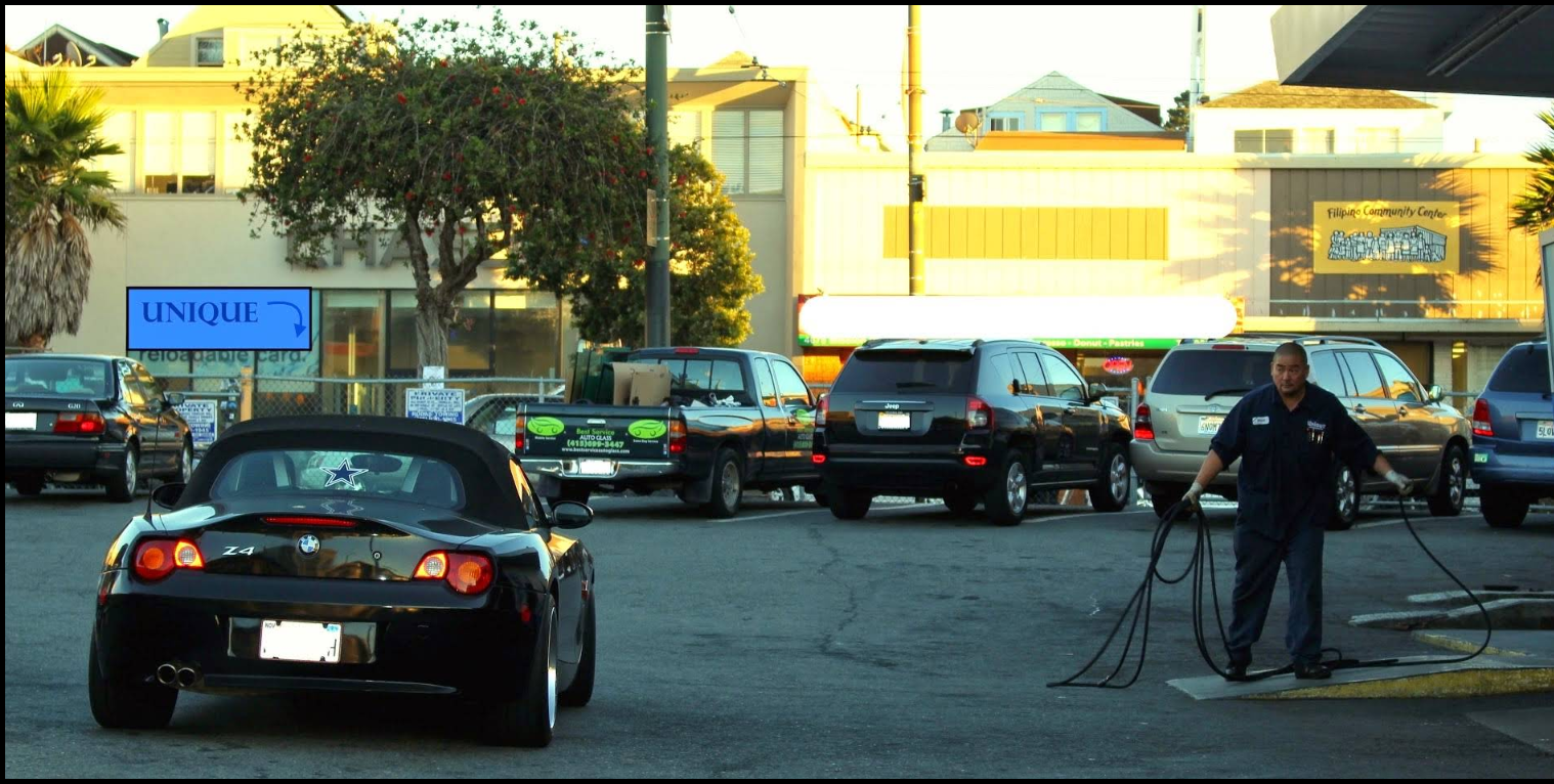 Customer cars and crew in the parking lot